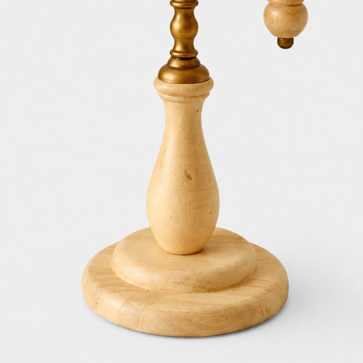 Close view of the turned wood base