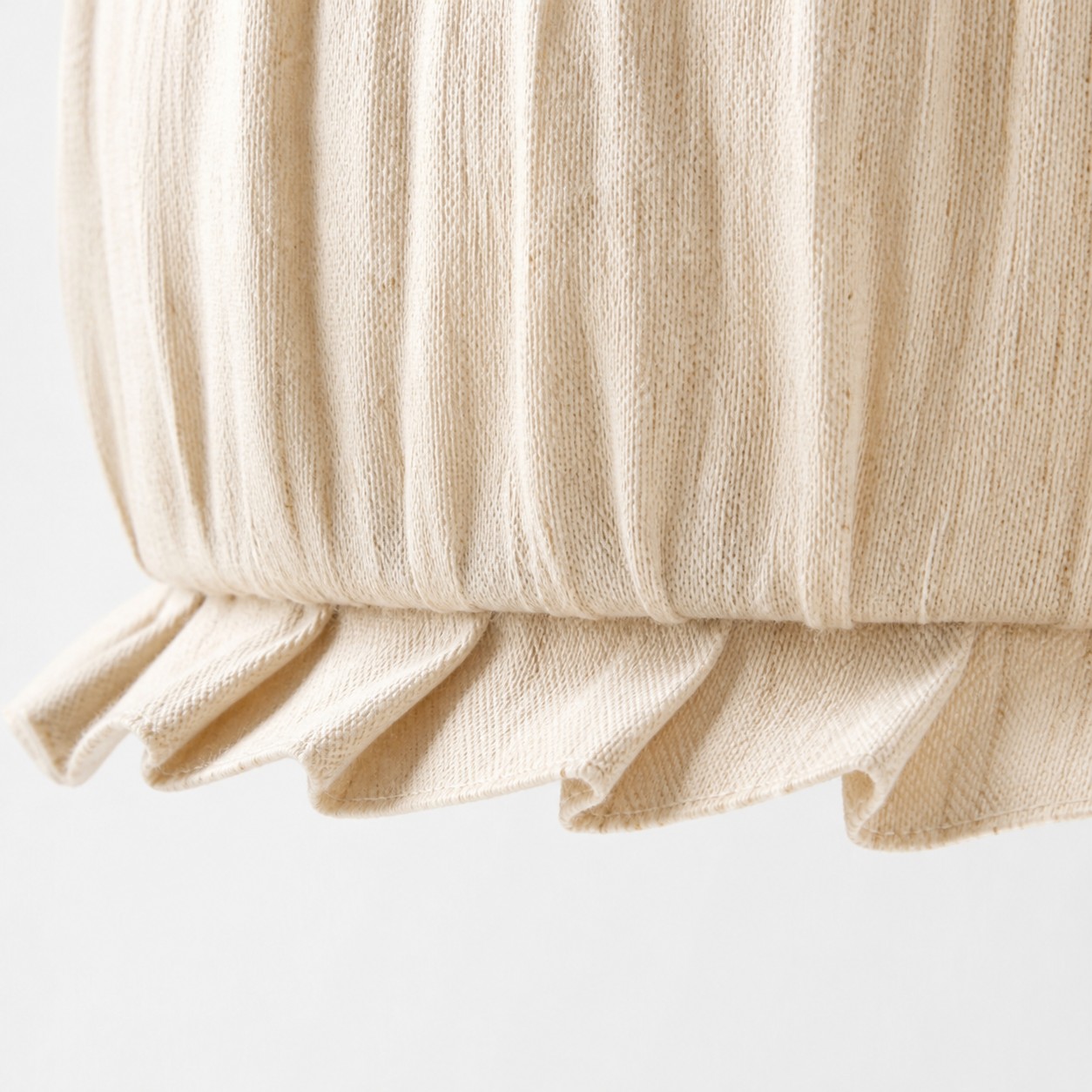 Natural Beige fabric weave and ruffled edge detail