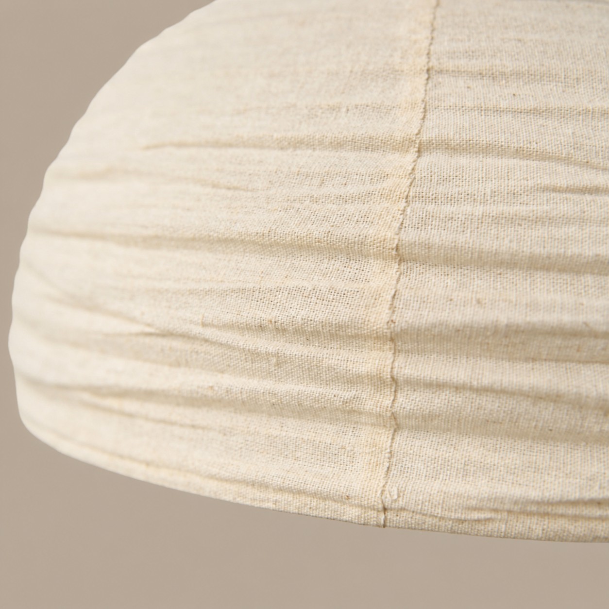 Close view of ivory gathered fabric shade