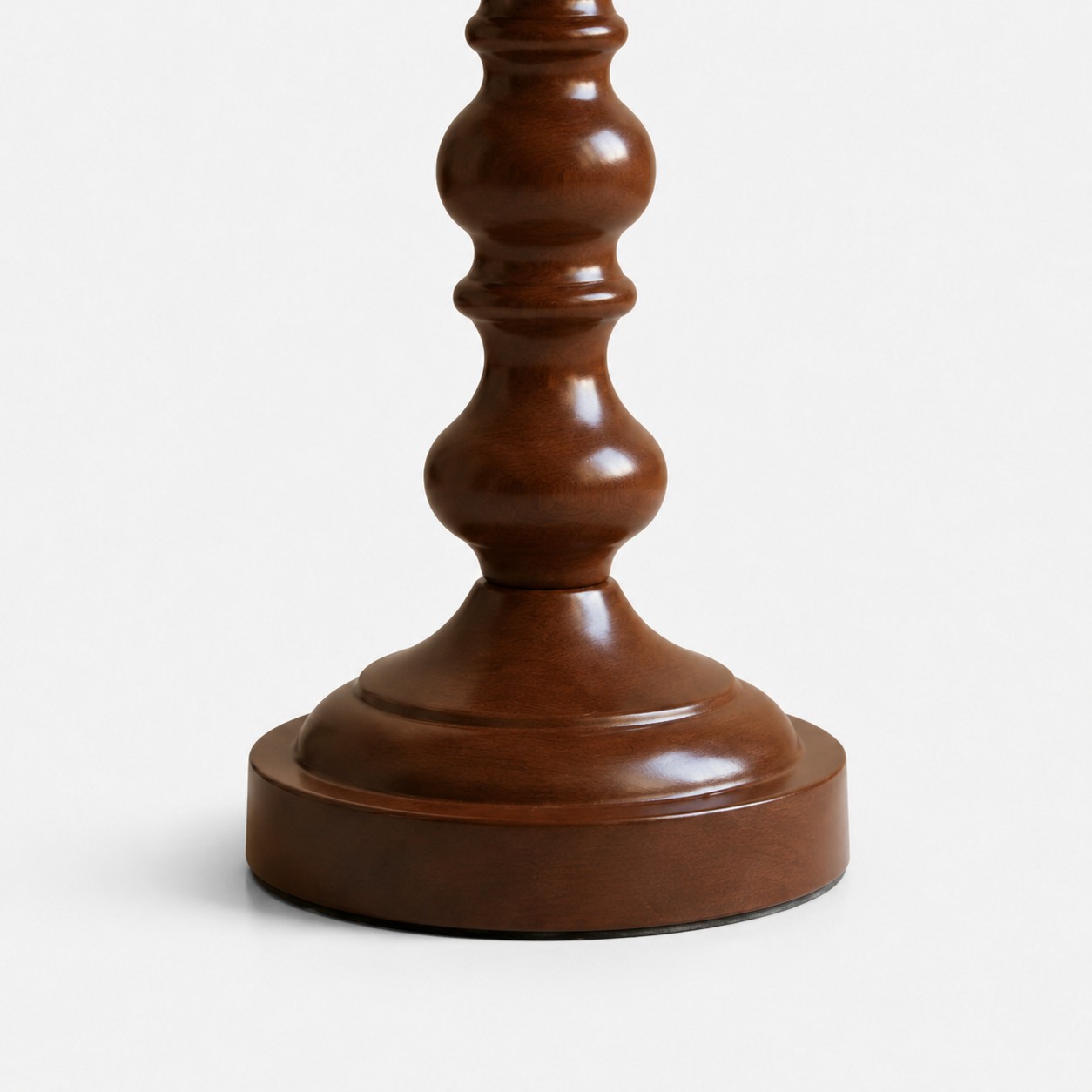 Close view of the gourd-shaped wood lamp base