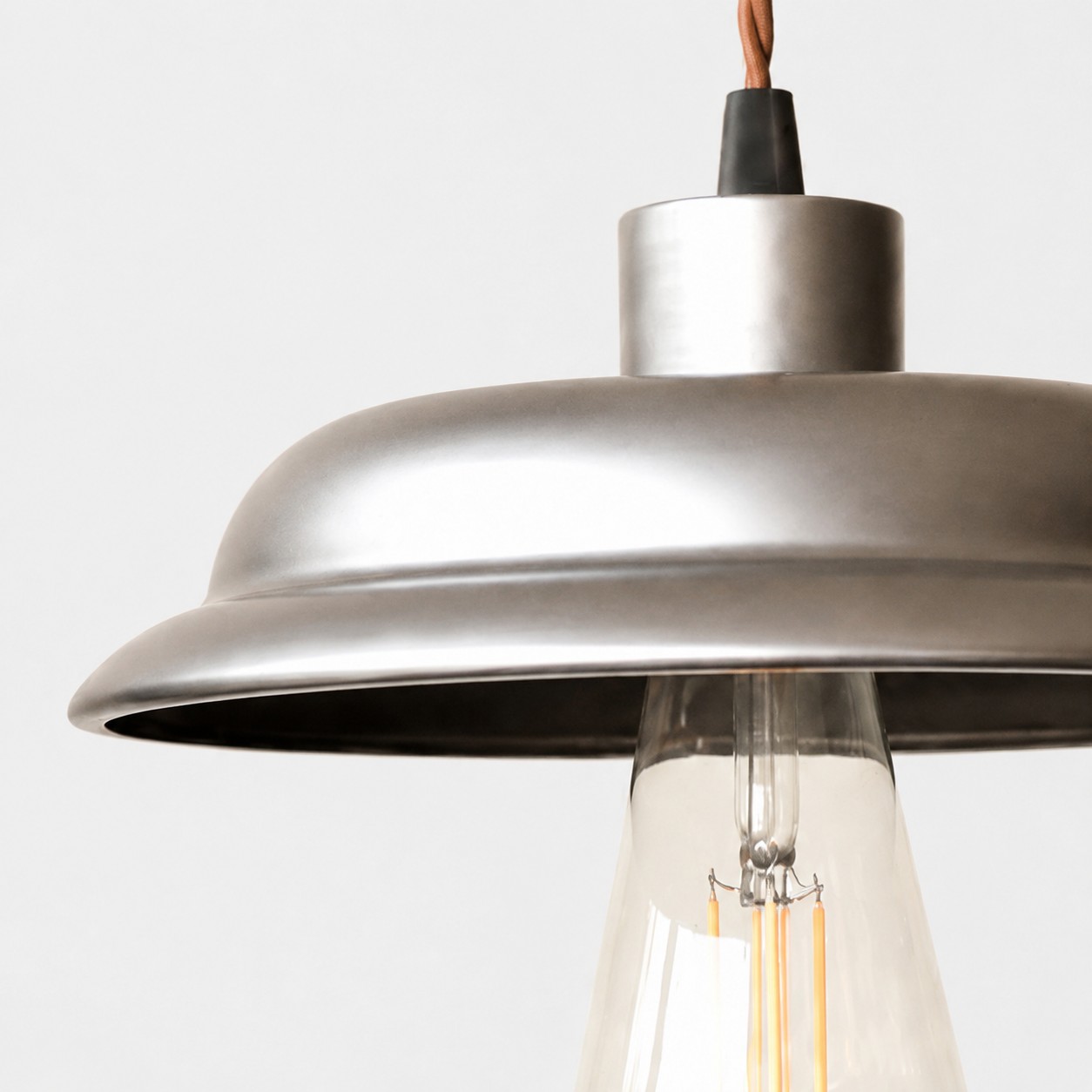 Wide disc pendant light detail