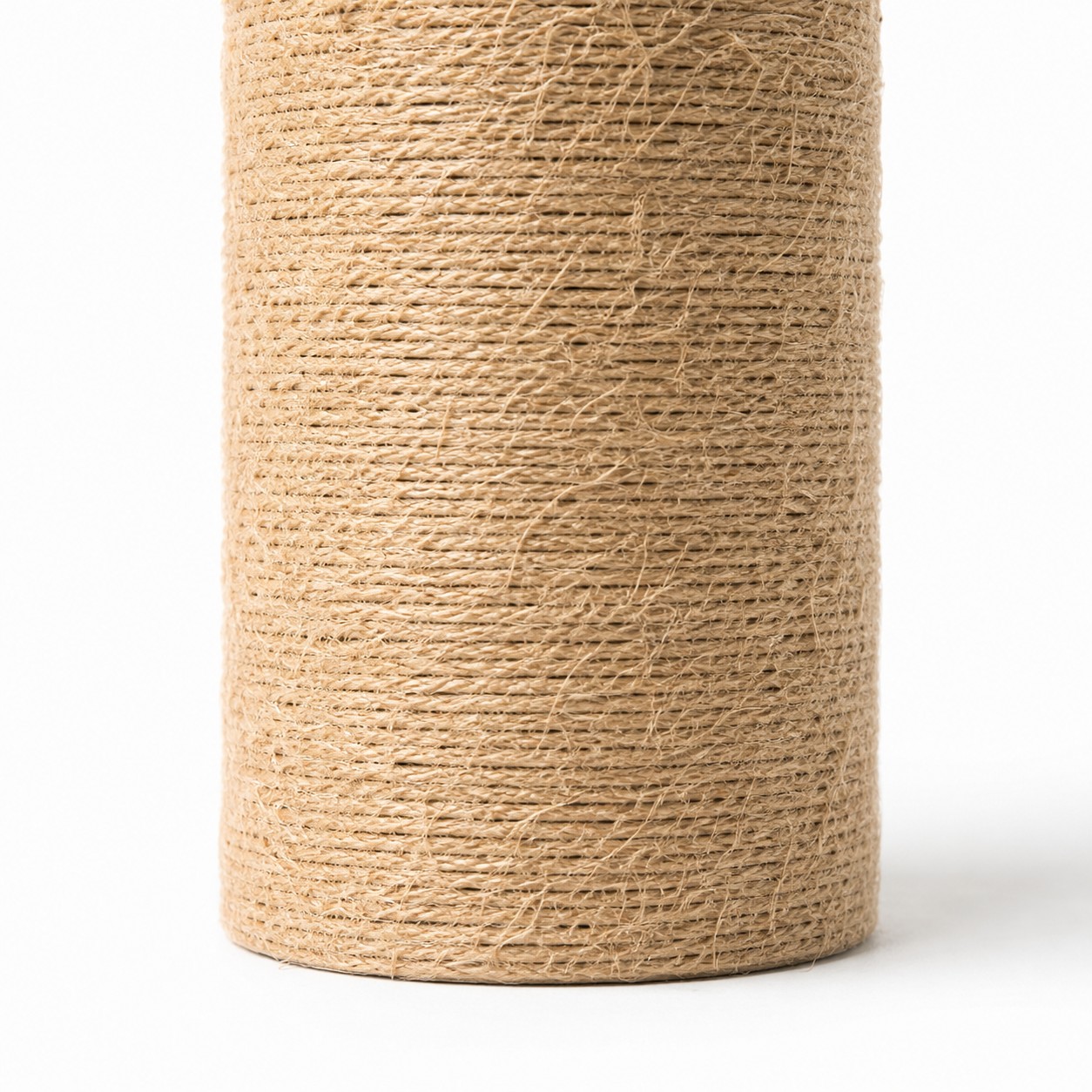 Vue rapprochée de la texture de la base de la lampe en jute tressée