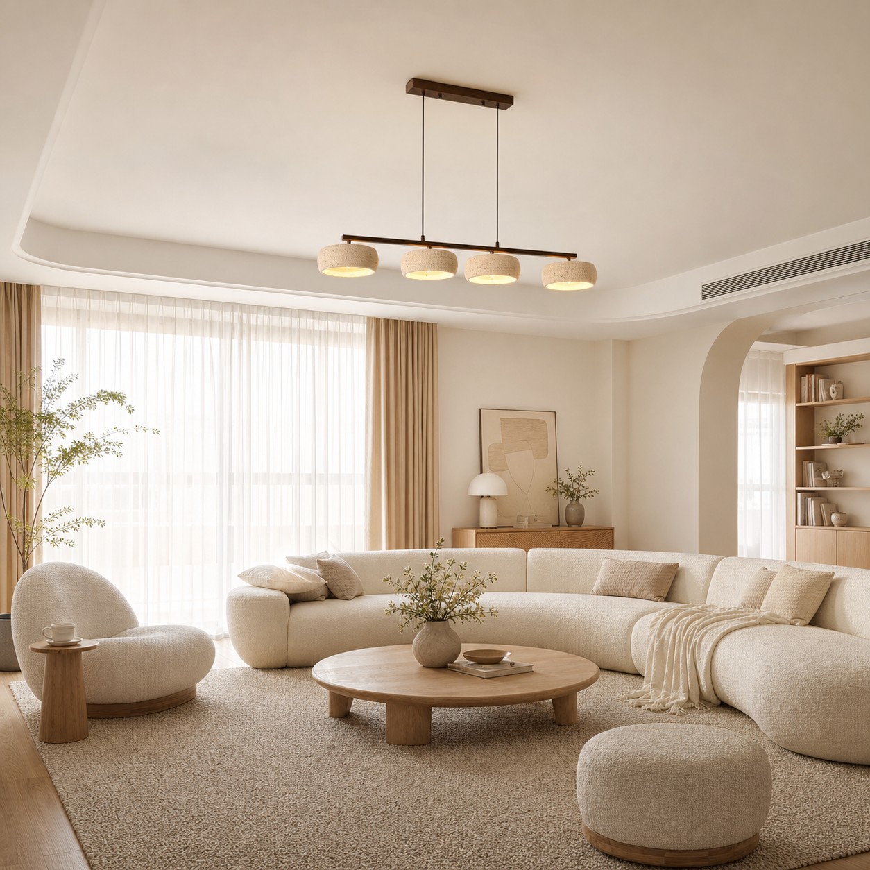 Neutral living room with long pendant placement