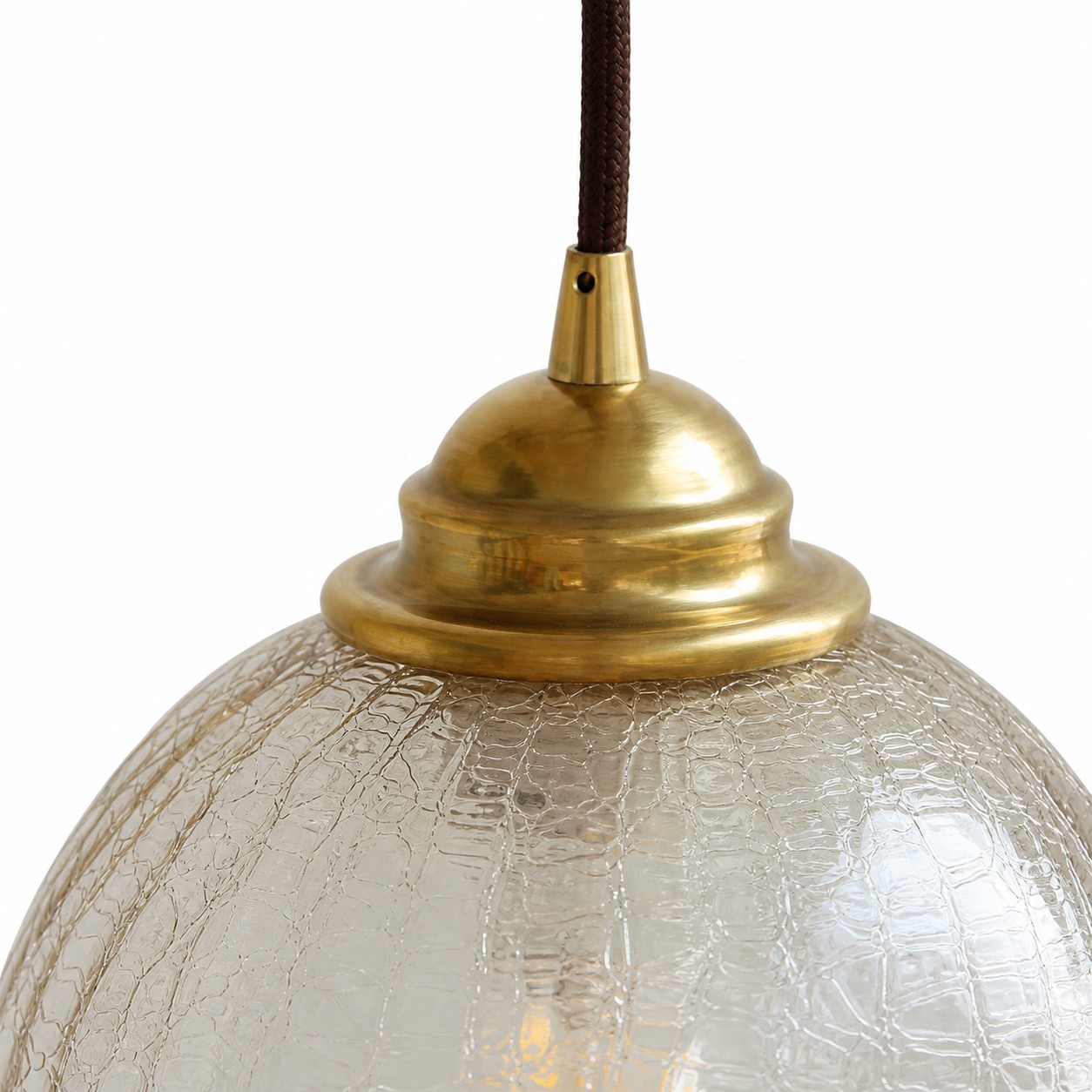 close view of brass cap and tea glass texture