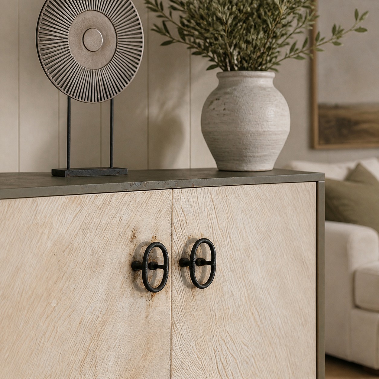 iron ring pulls installed on cabinet doors