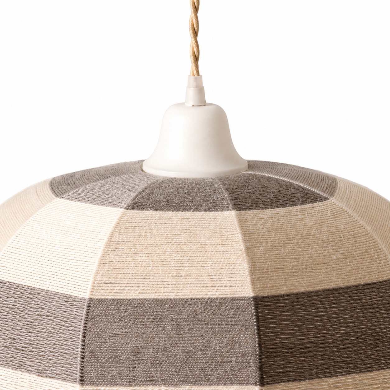 Close-up of white ceiling canopy and hand-wrapped cotton thread shade