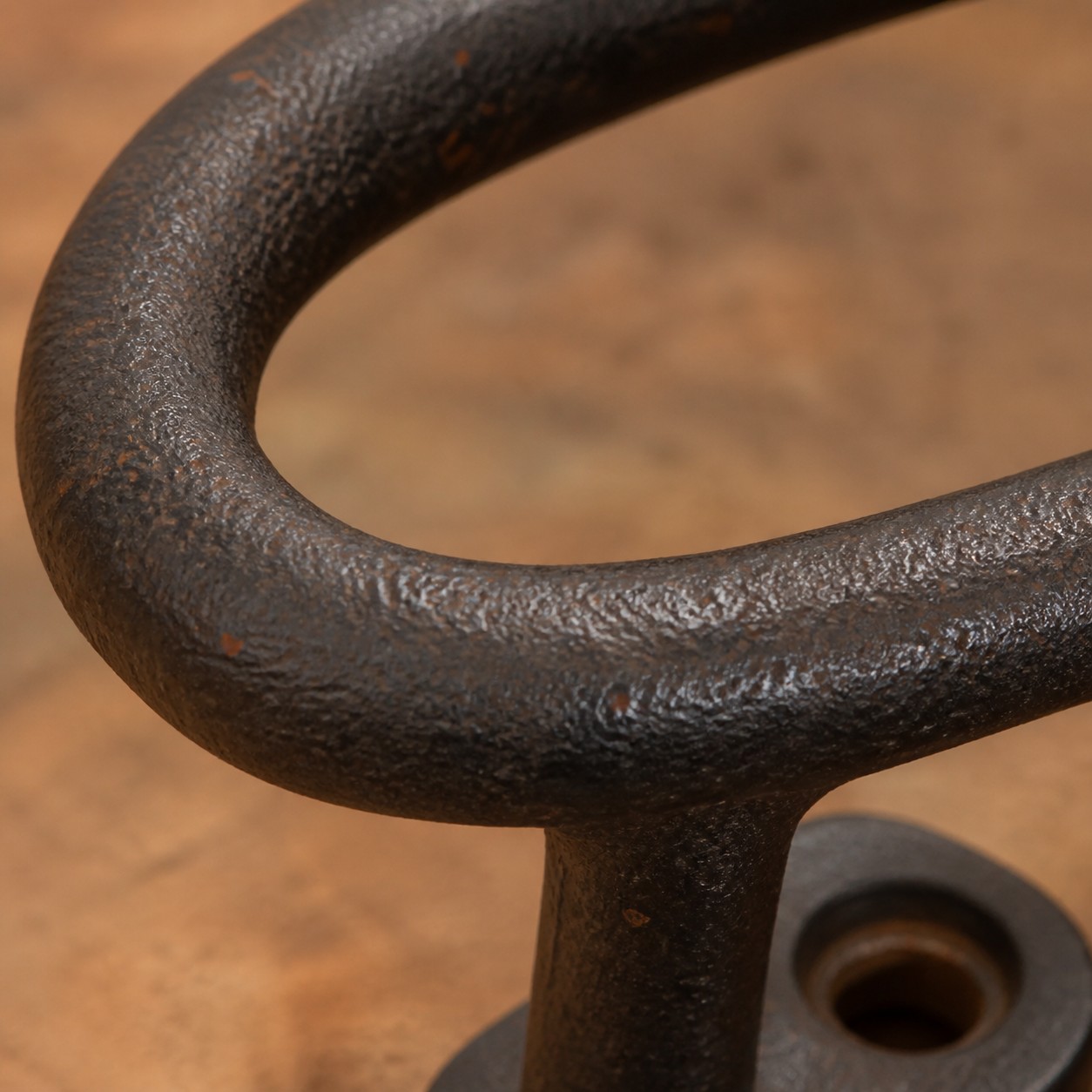 round black iron wall mount detail