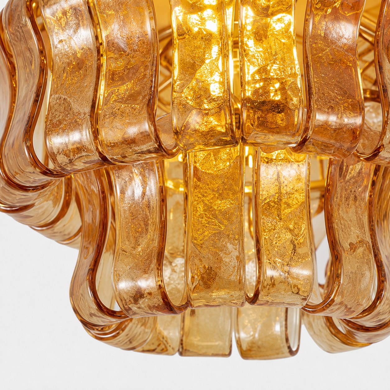 Layered amber textured glass illuminated from within