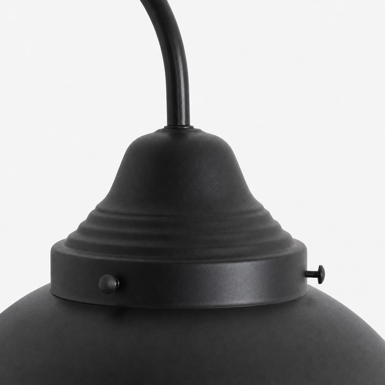 Matte black upper housing and curved arm detail