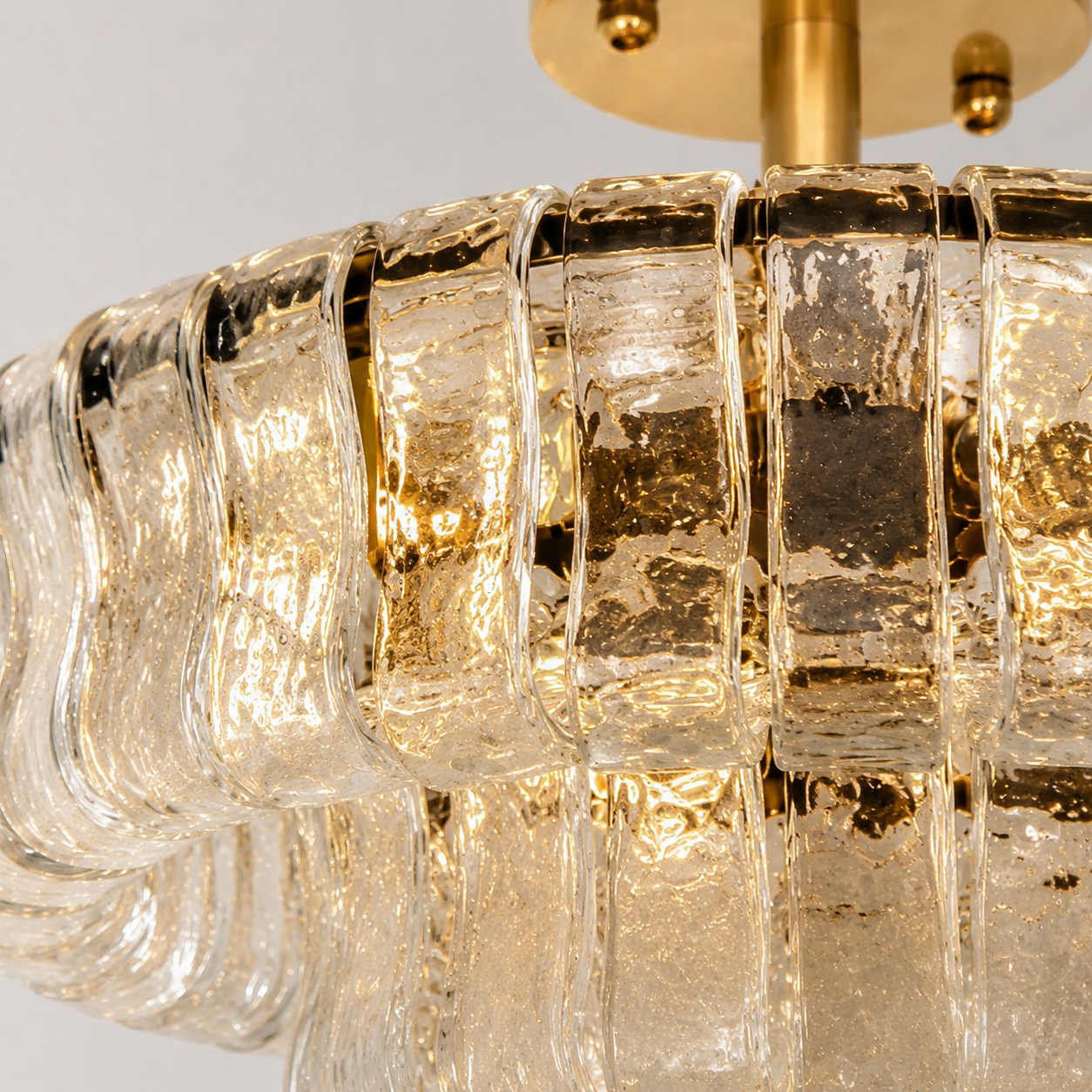 Close view of ripple glass panels on the chandelier