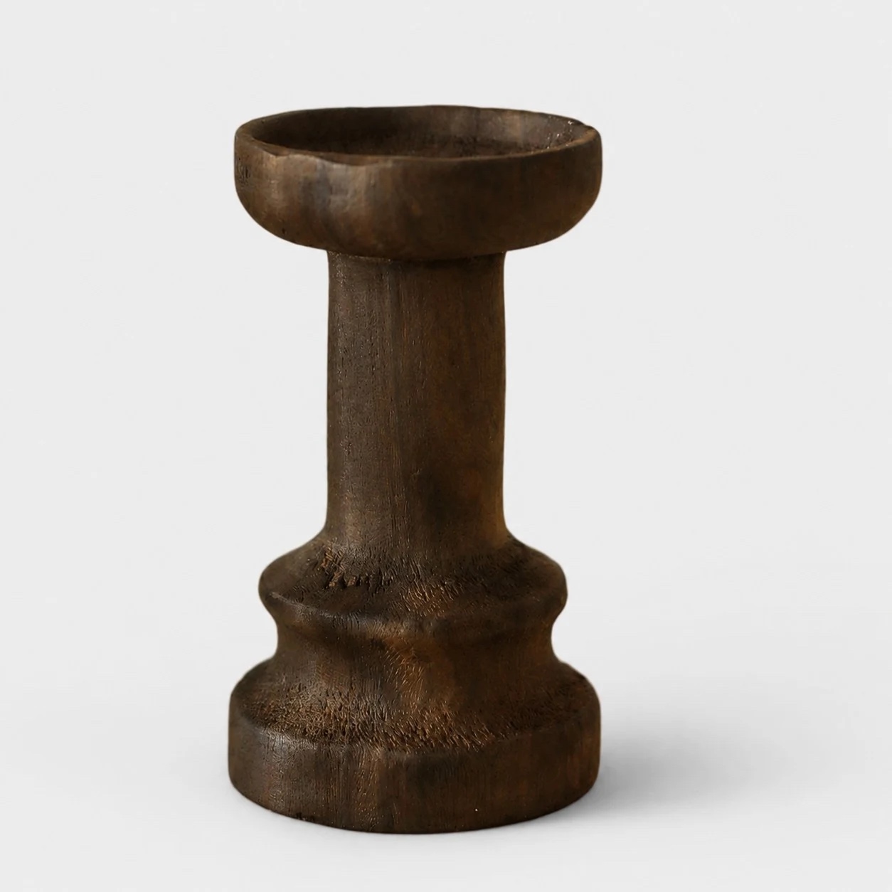 Tall dark solid wood candle holder