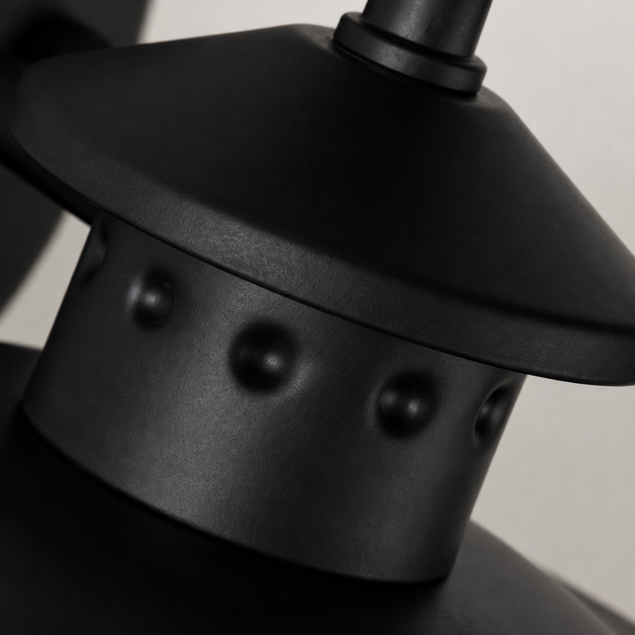 Détail de la casquette rivetée