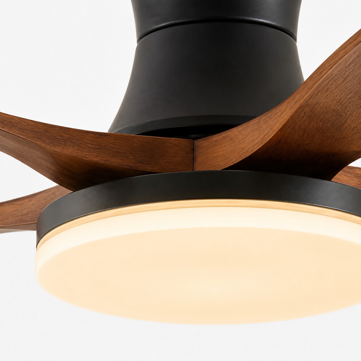 Close view of the acrylic diffuser below the ceiling fan light