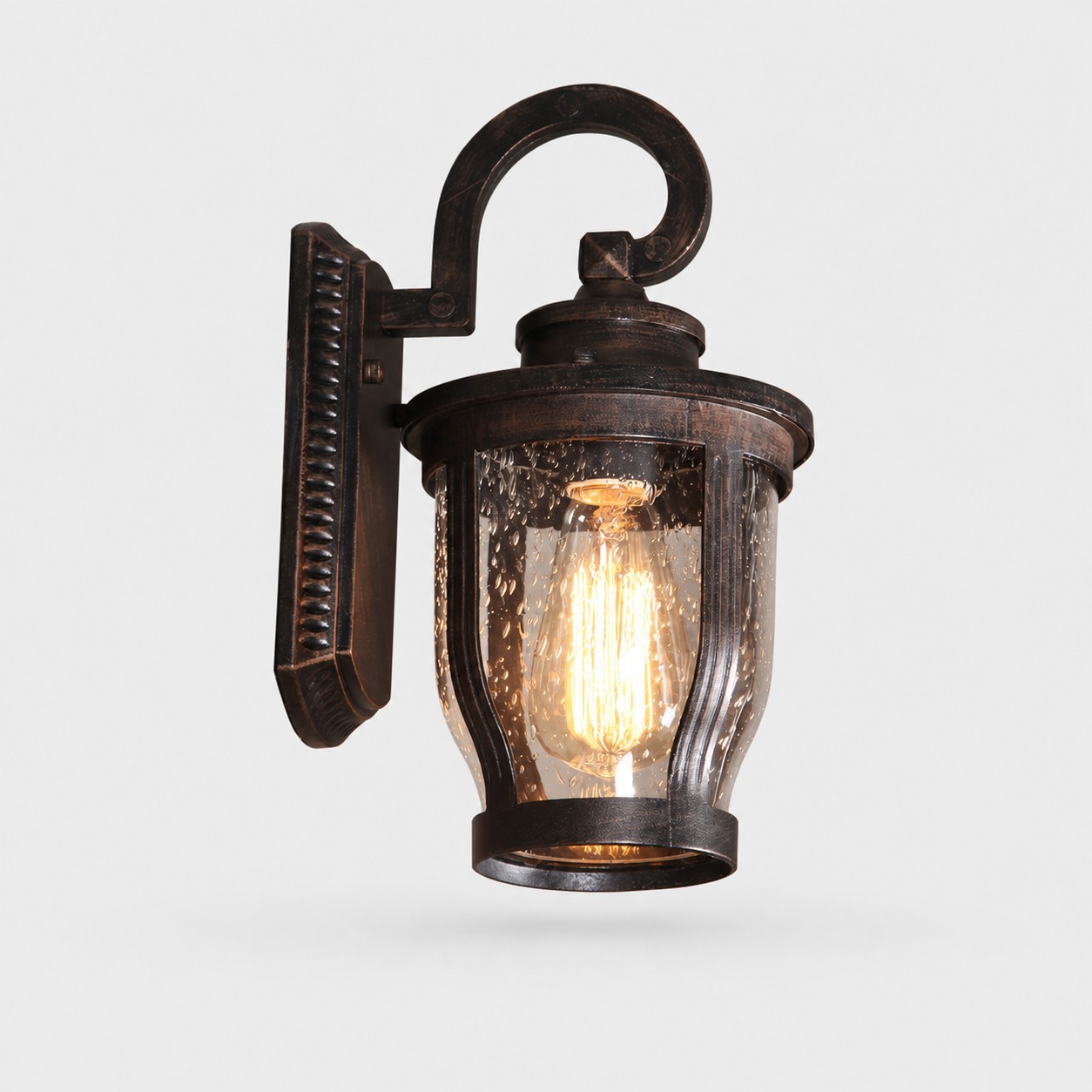 antique bronze rain glass outdoor wall sconce on gray background