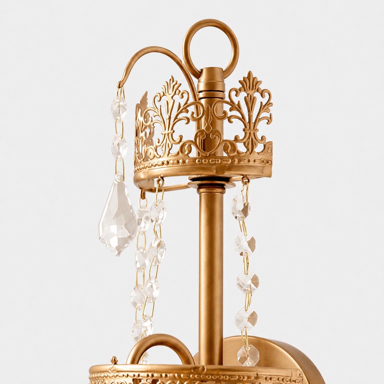 Close view of the floral metal crown and faceted K9 crystal drops