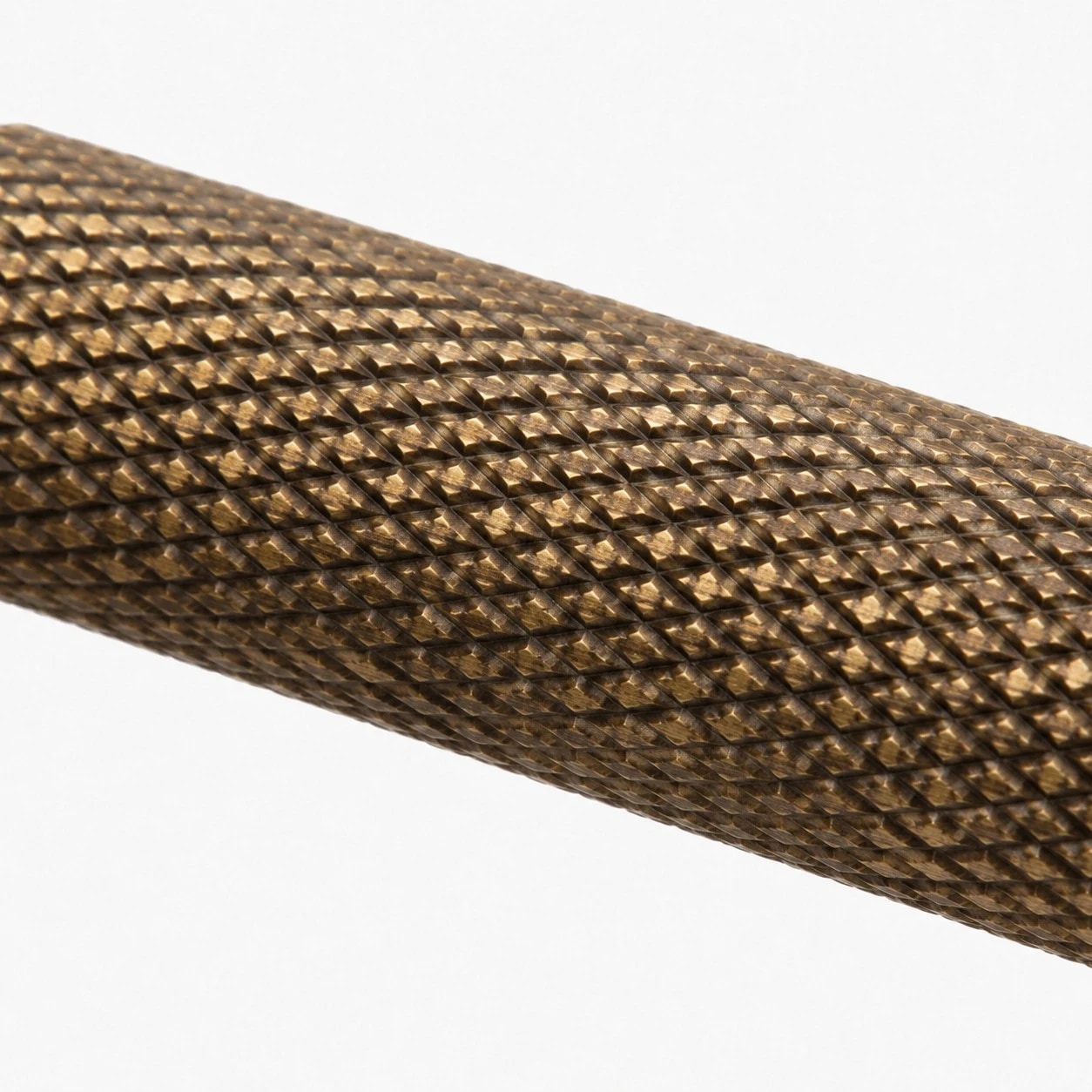 Close view of textured brass grip pattern
