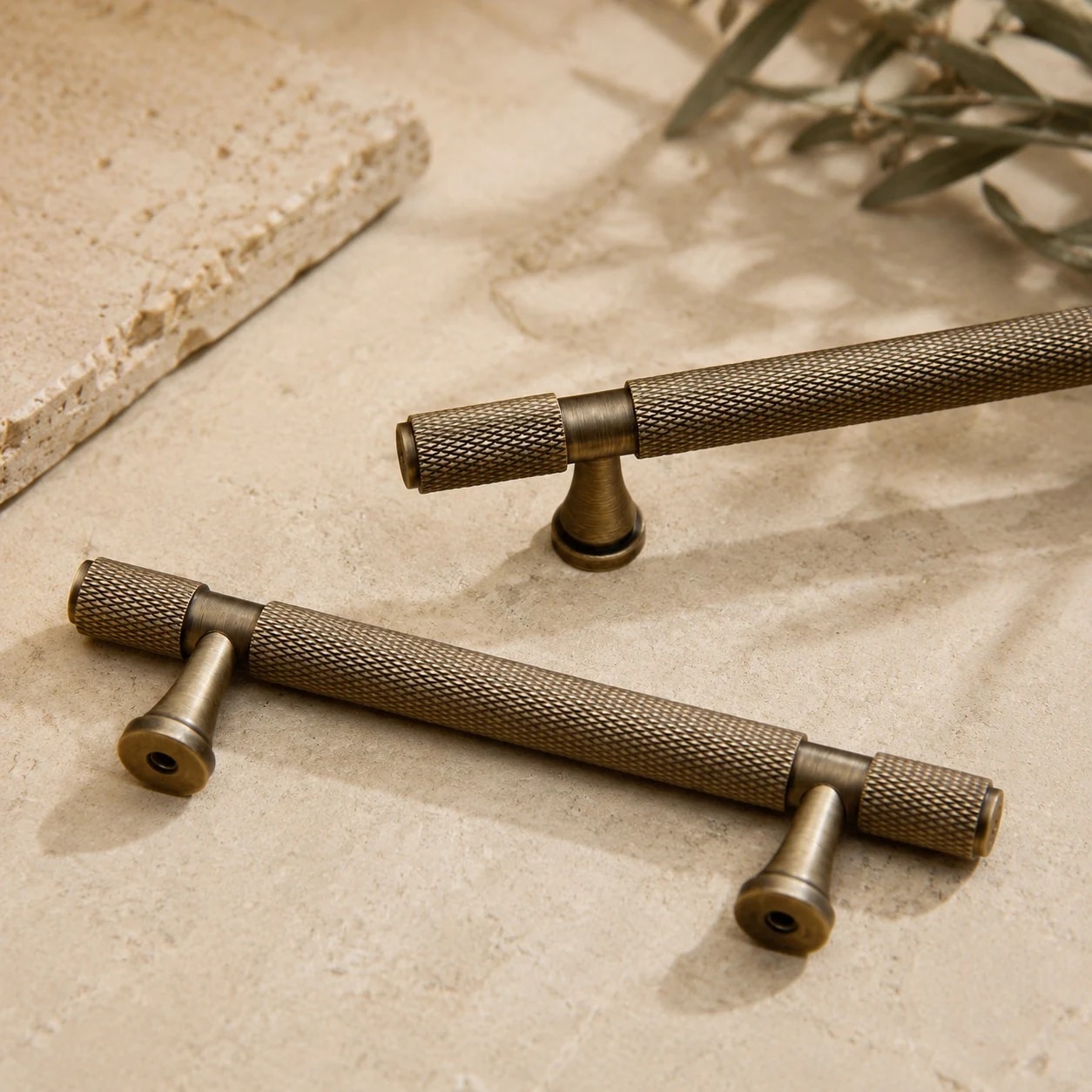 Loose antique brass cabinet pulls showing full shape