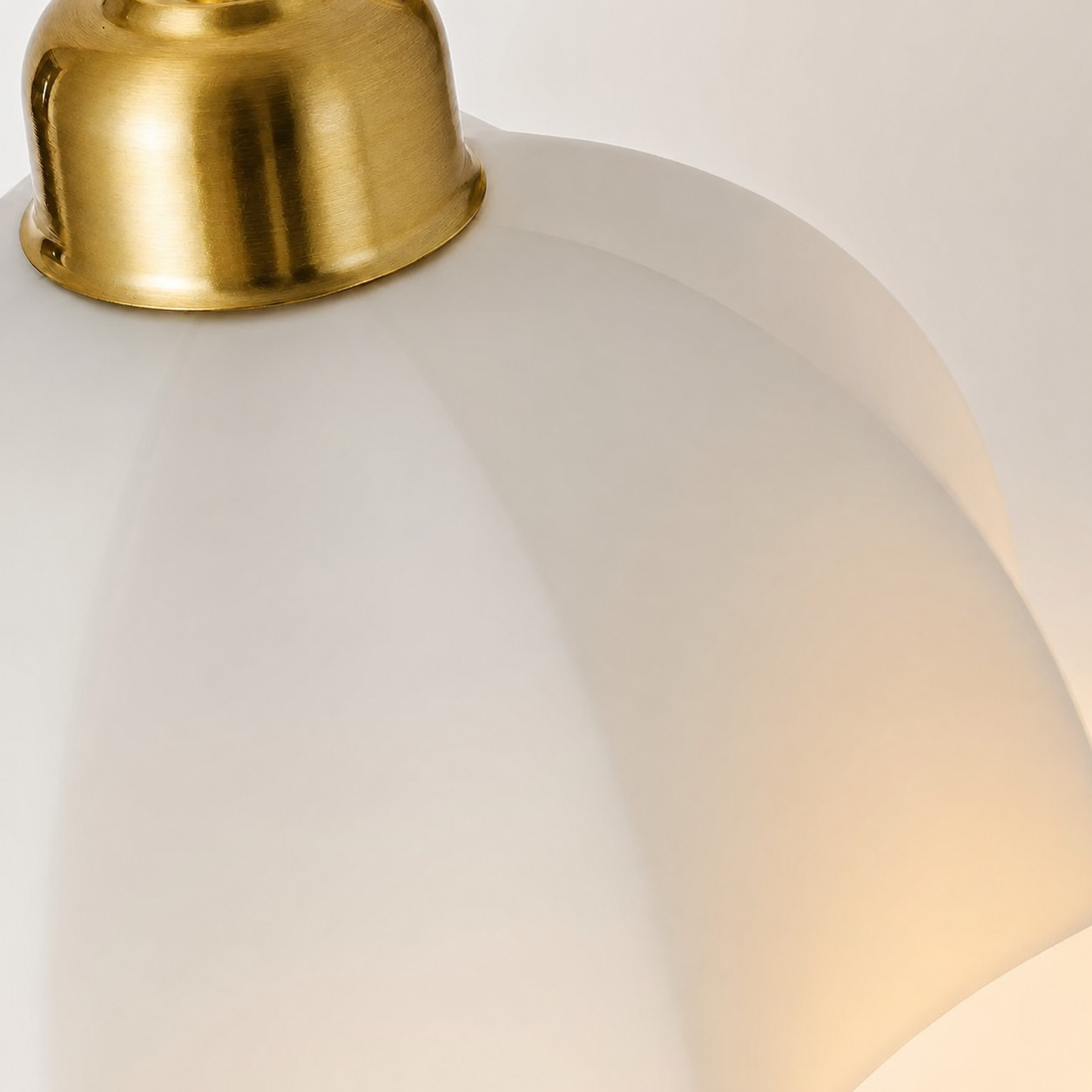 Close view of milk glass shade and metal fitting