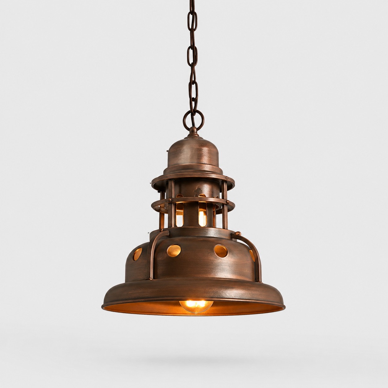 antique bronze industrial iron pendant light on gray background