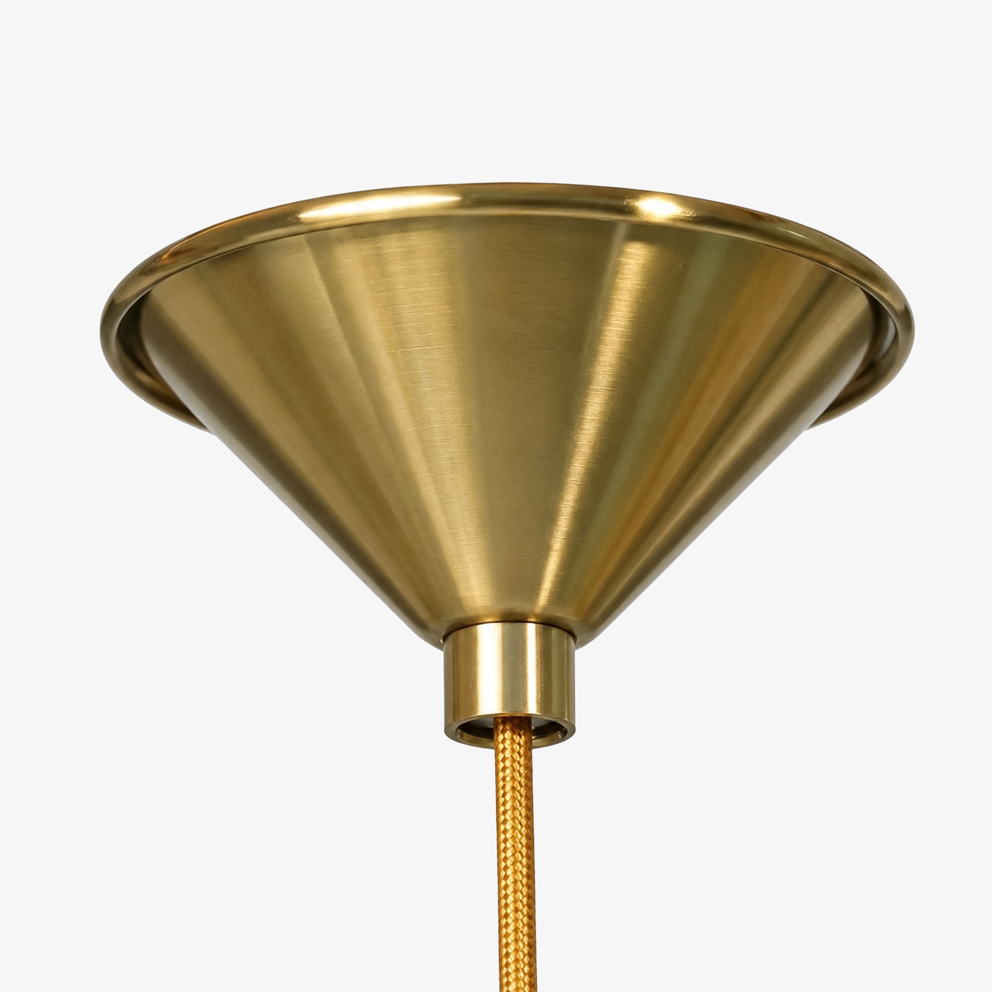 Close-up of fluted brass canopy on Calvor pendant light