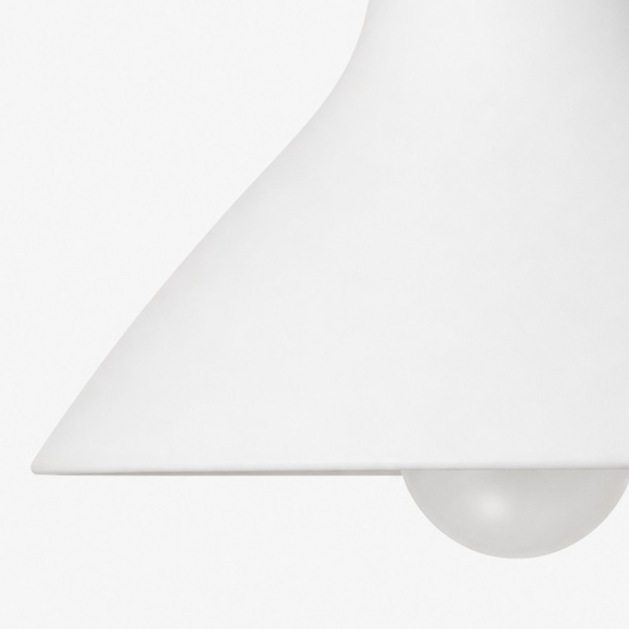 Close-up of white porcelain shade surface and lower edge