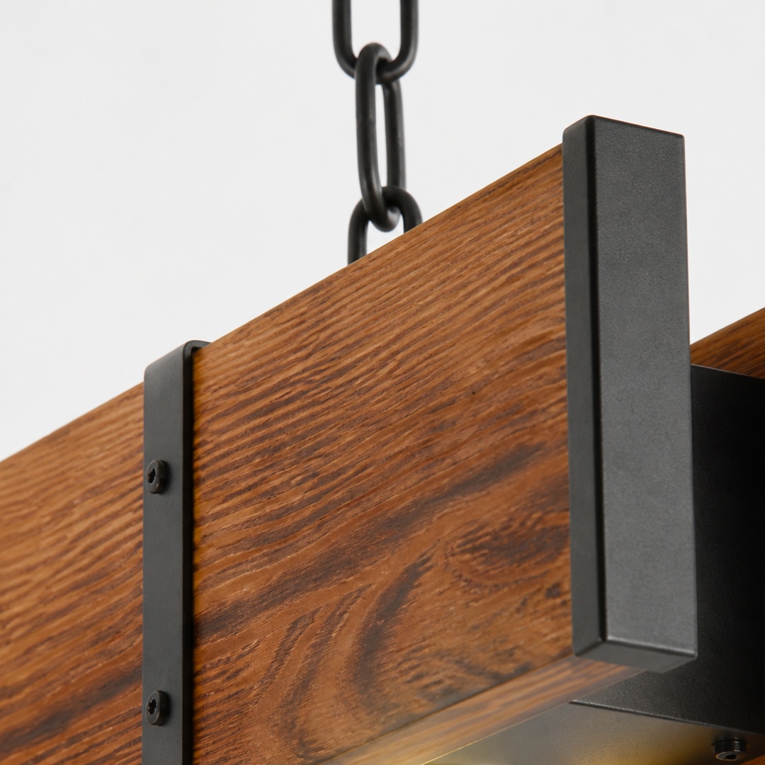 Wood beam end with dark metal straps