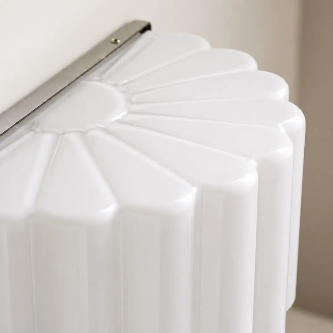 Top detail of the pleated white glass shade