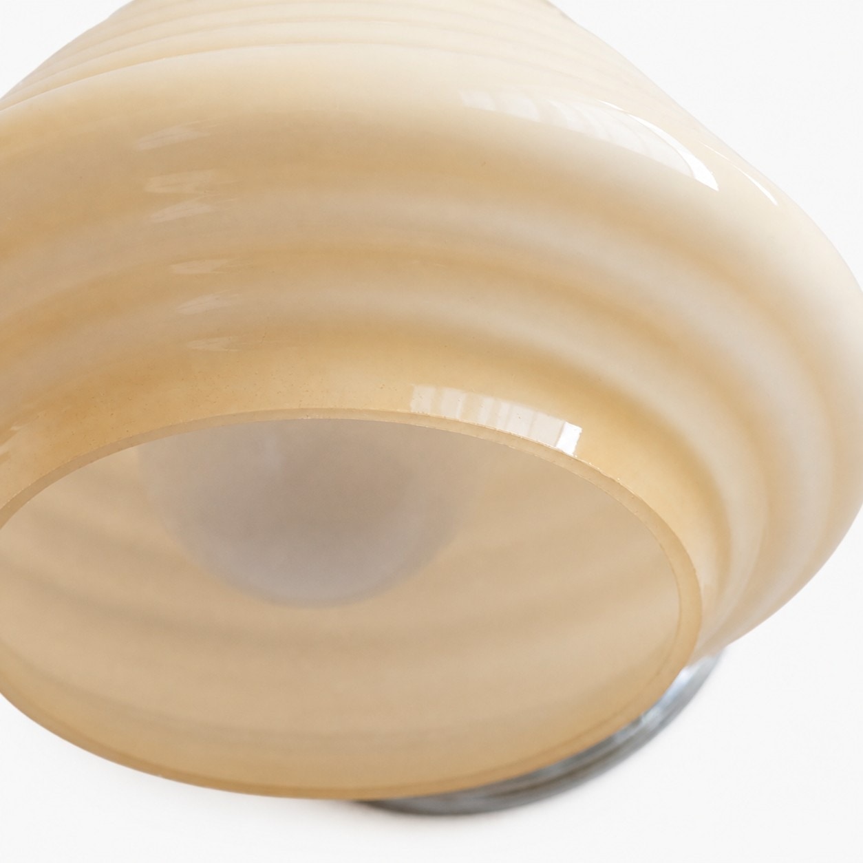 Creamy yellow ribbed glass shade close detail