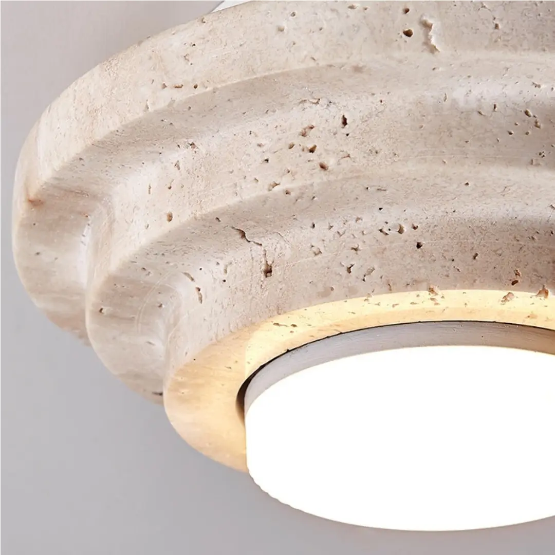 Close-up of the travertine edge and illuminated diffuser