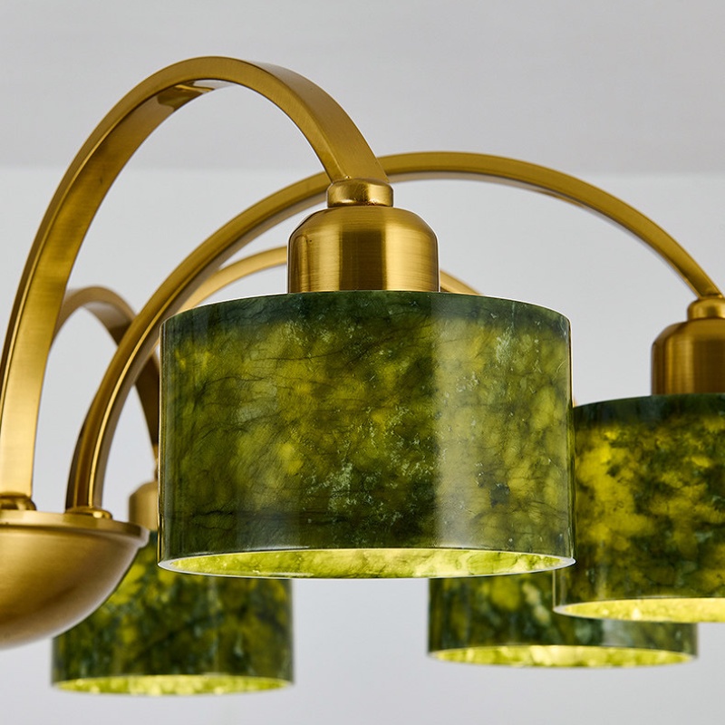 Layered arched arms around the jade shades