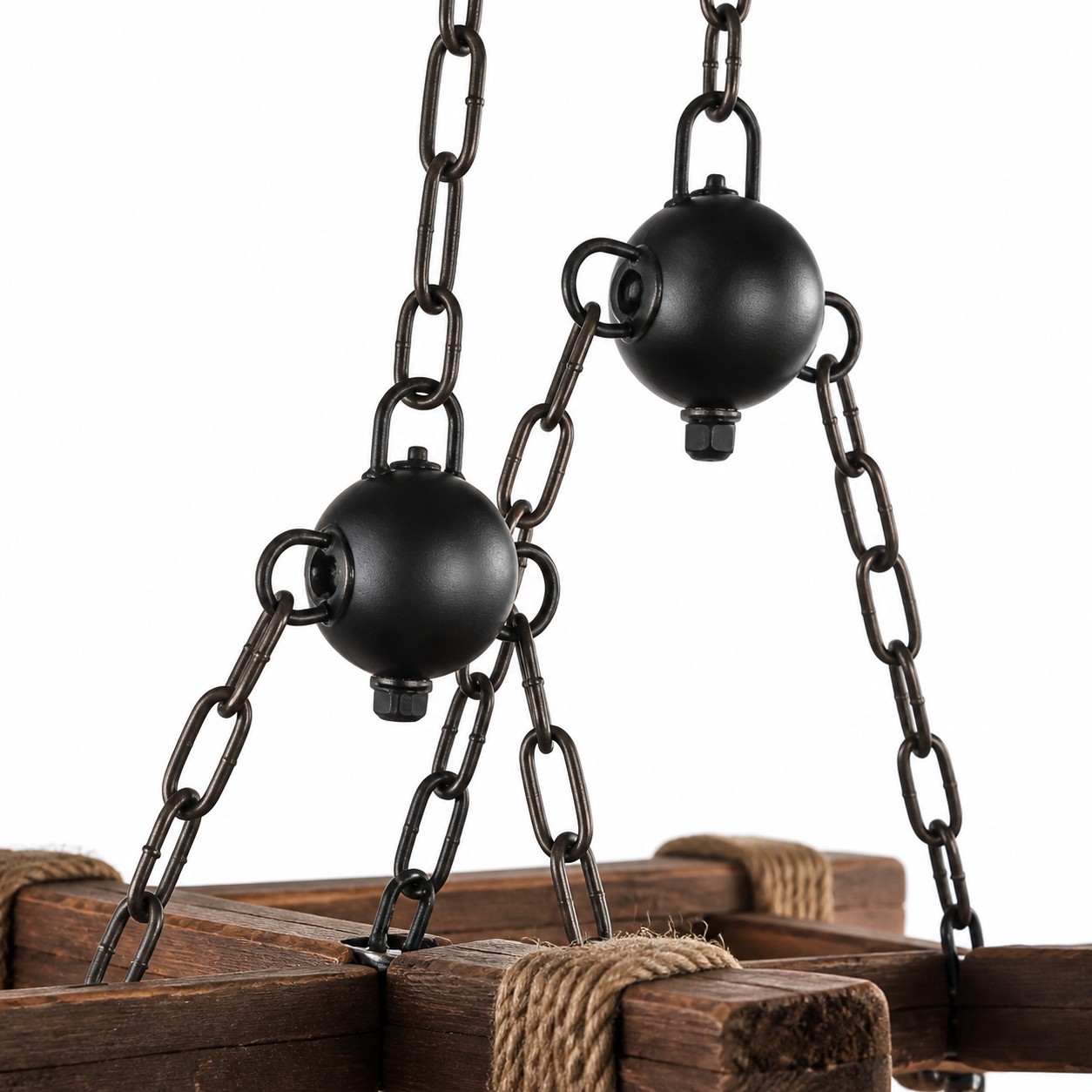 Black chain suspension above the wood frame