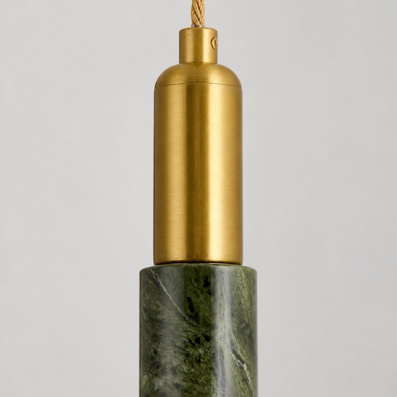 Brass housing joined to the jade body