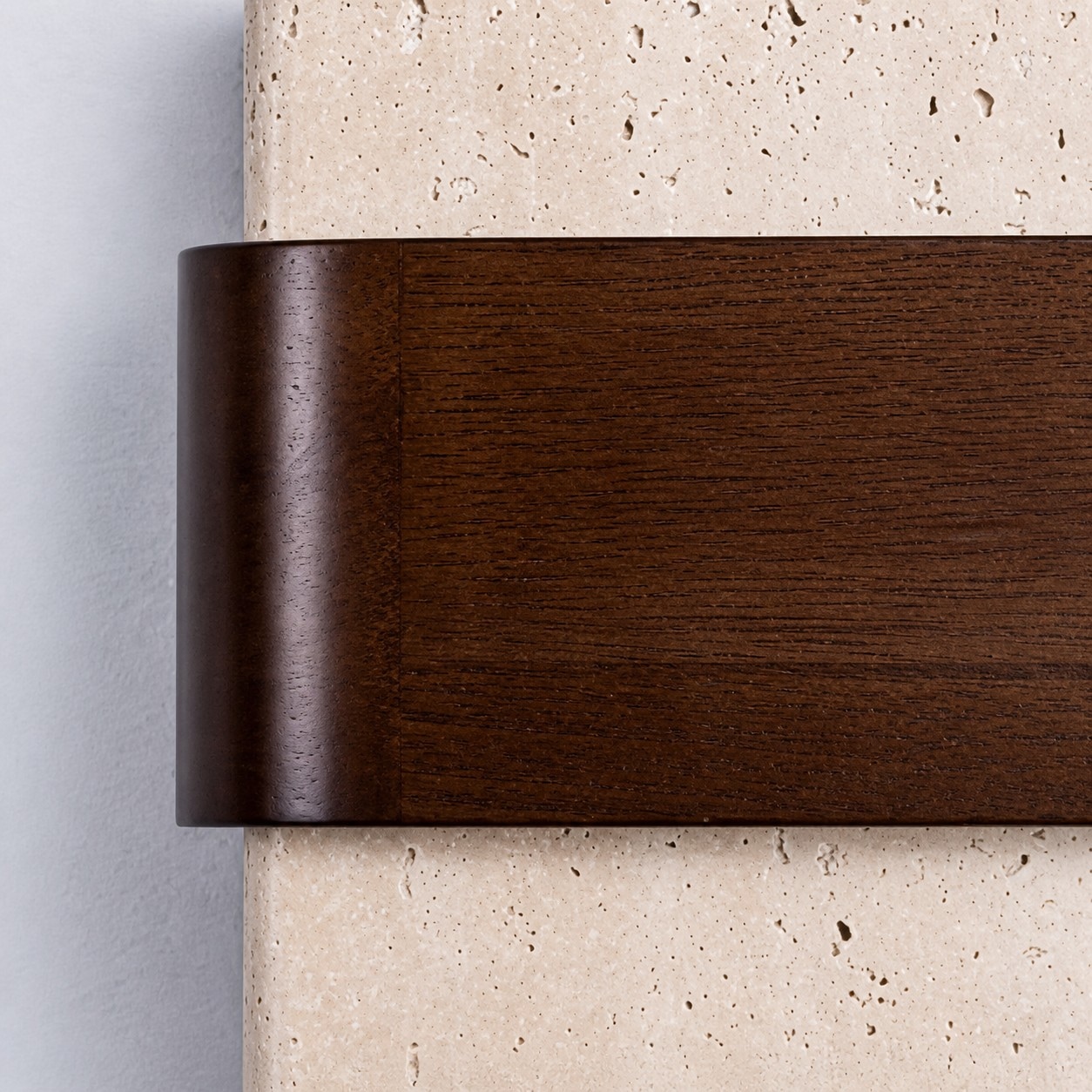 Solid wood grain and travertine stone surface detail