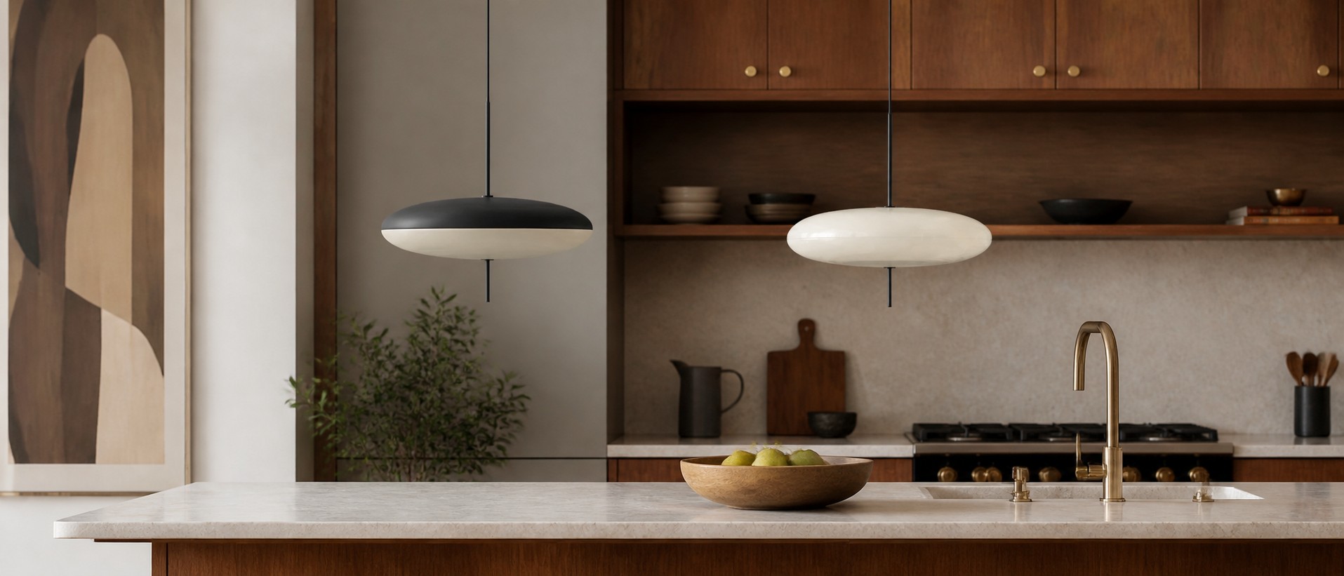 Two sculptural pendant lights in a warm contemporary kitchen