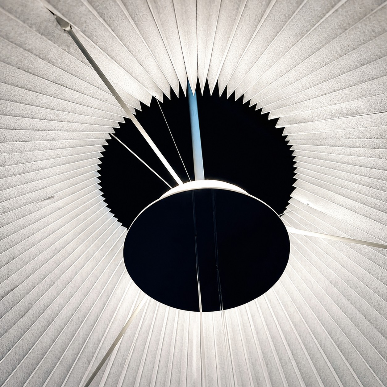 Close view of adjustable pleated pendant light louvered shade design