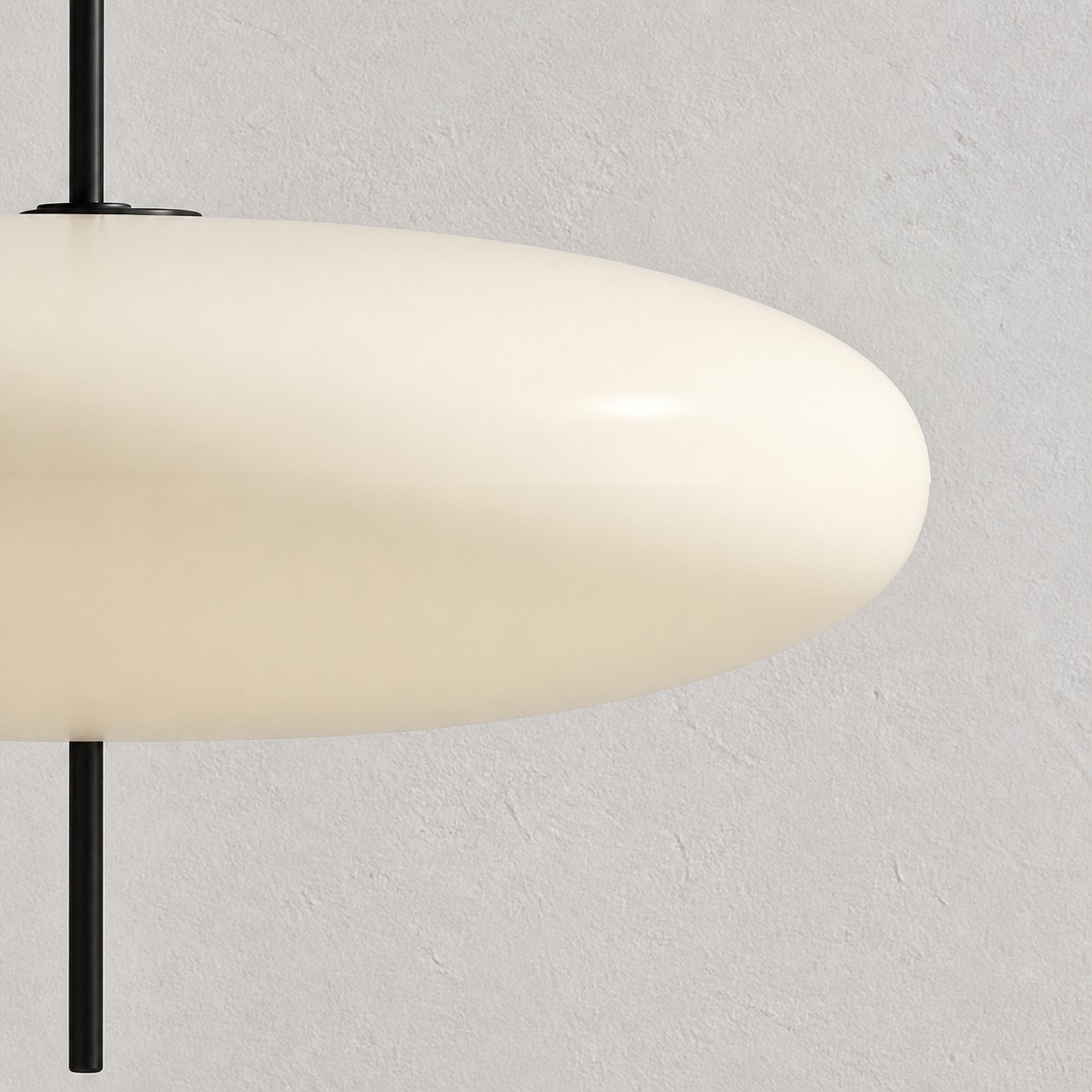 Top view of the white shade and black suspension
