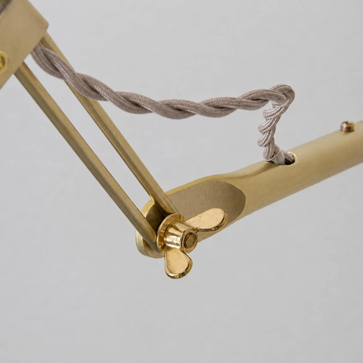 Close-up of the folding brass arm joint