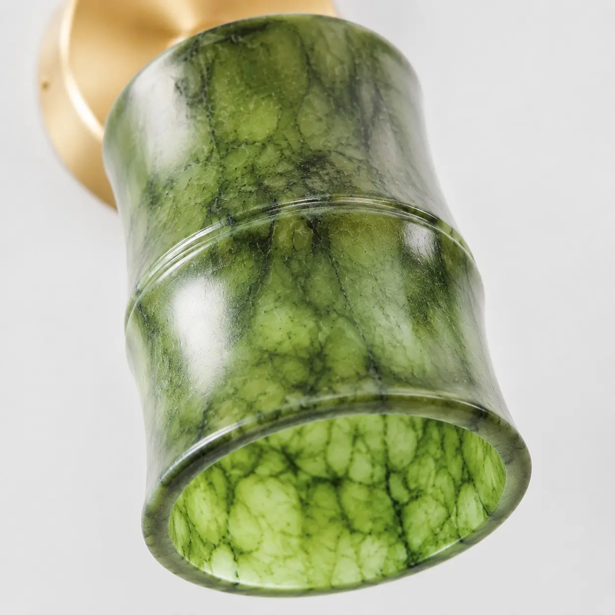 Close view of the green jade shade pattern and polished edge