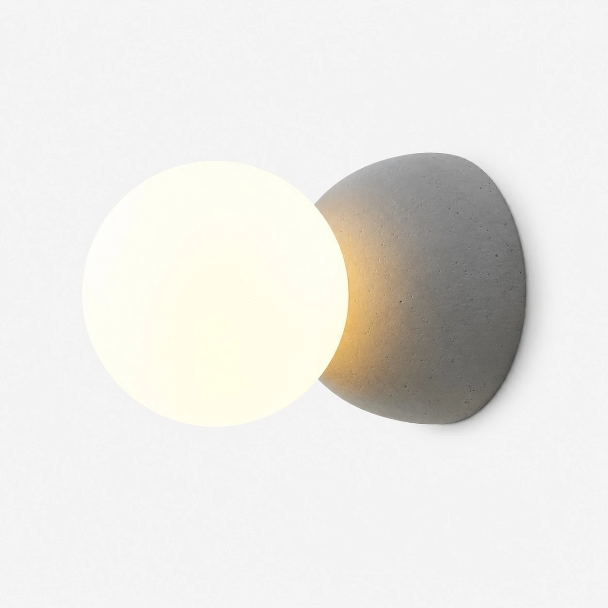 Grey concrete wall light with white opal glass globe