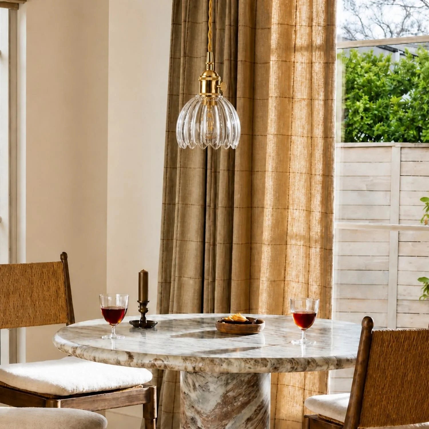 Ribbed tulip glass pendant in a living dining interior