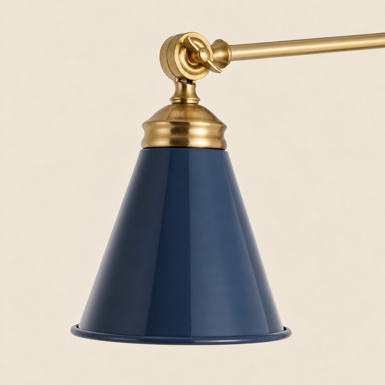 Close view of the blue iron cone shade with a white interior